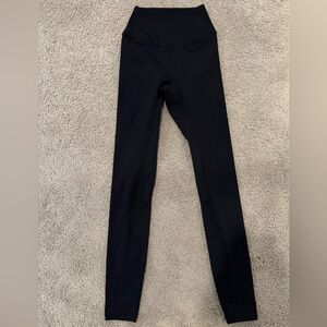 Black, crossed leggings from Crop Shop Boutique. Size XS